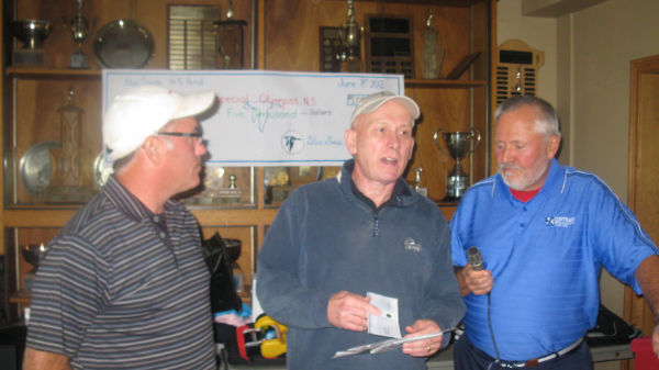 
Walter Tingley, Chair of 2012 Honker Classic, and Ross Haynes, MLG, presenting a $5000 cheque to Gander Tom Anderson, Director of Special Olympics 